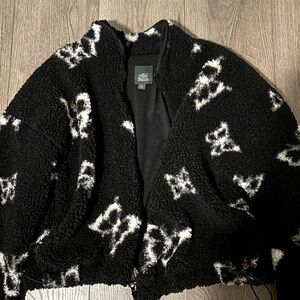 black jacket with white butterflies. size S. smoke free/pet free home.